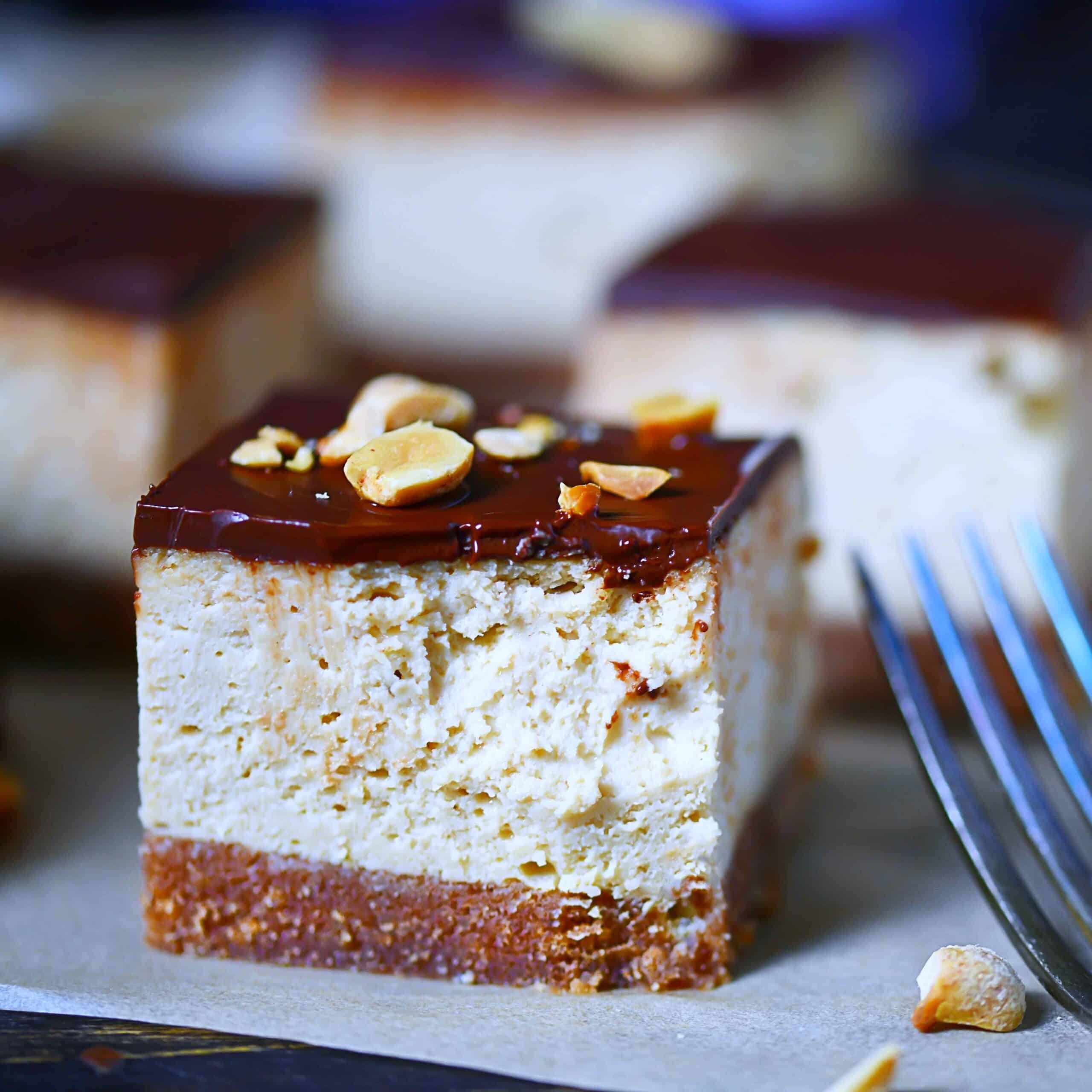 Closeup photo low-carb peanut butter cheesecake with peanuts